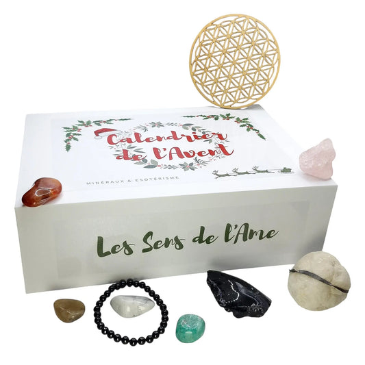 Calendrier de l'Avent lithothérapie fermé avec pierres naturelles et produits ésotériques à côté